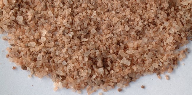Redmond Natural Trace Mineral Salt is pink, tan, white, and grey in color.  Buy Redmond salt for your livestock animals!